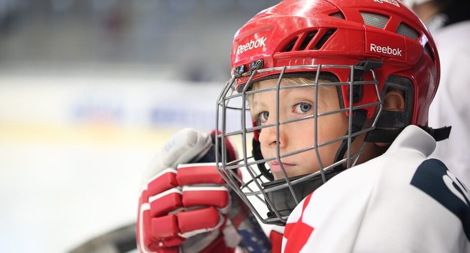 Student waiting to play hockey